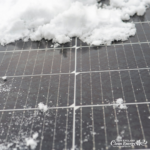 solar panels and snow