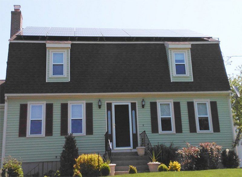 solar panel installation on steep barn type roof