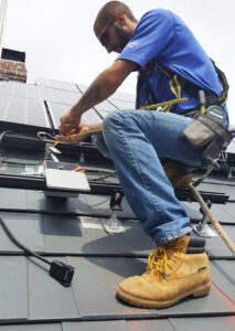 clean energy installs solar on metal roof